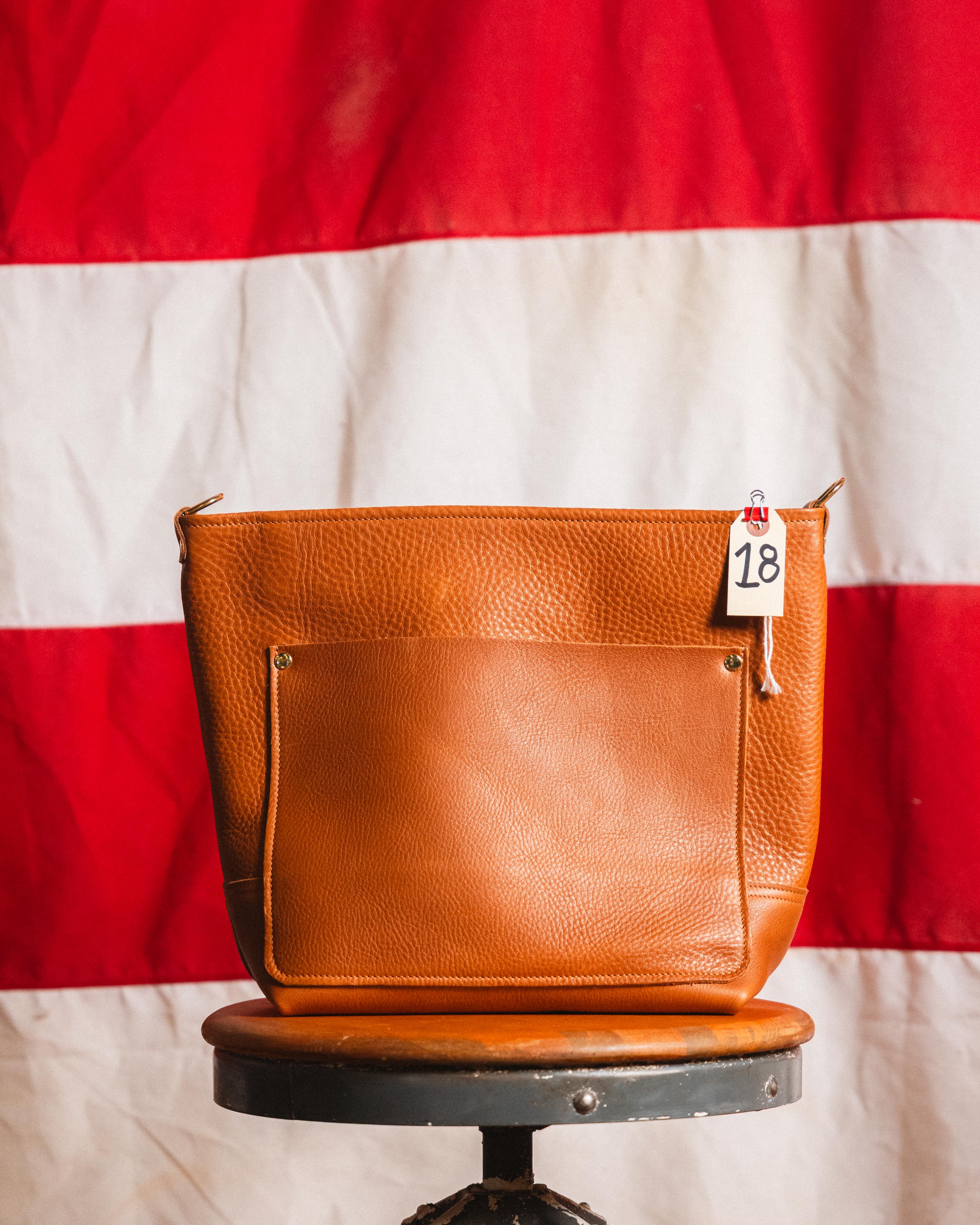 18. Cognac Cypress Crossbody Travel Panel Tote