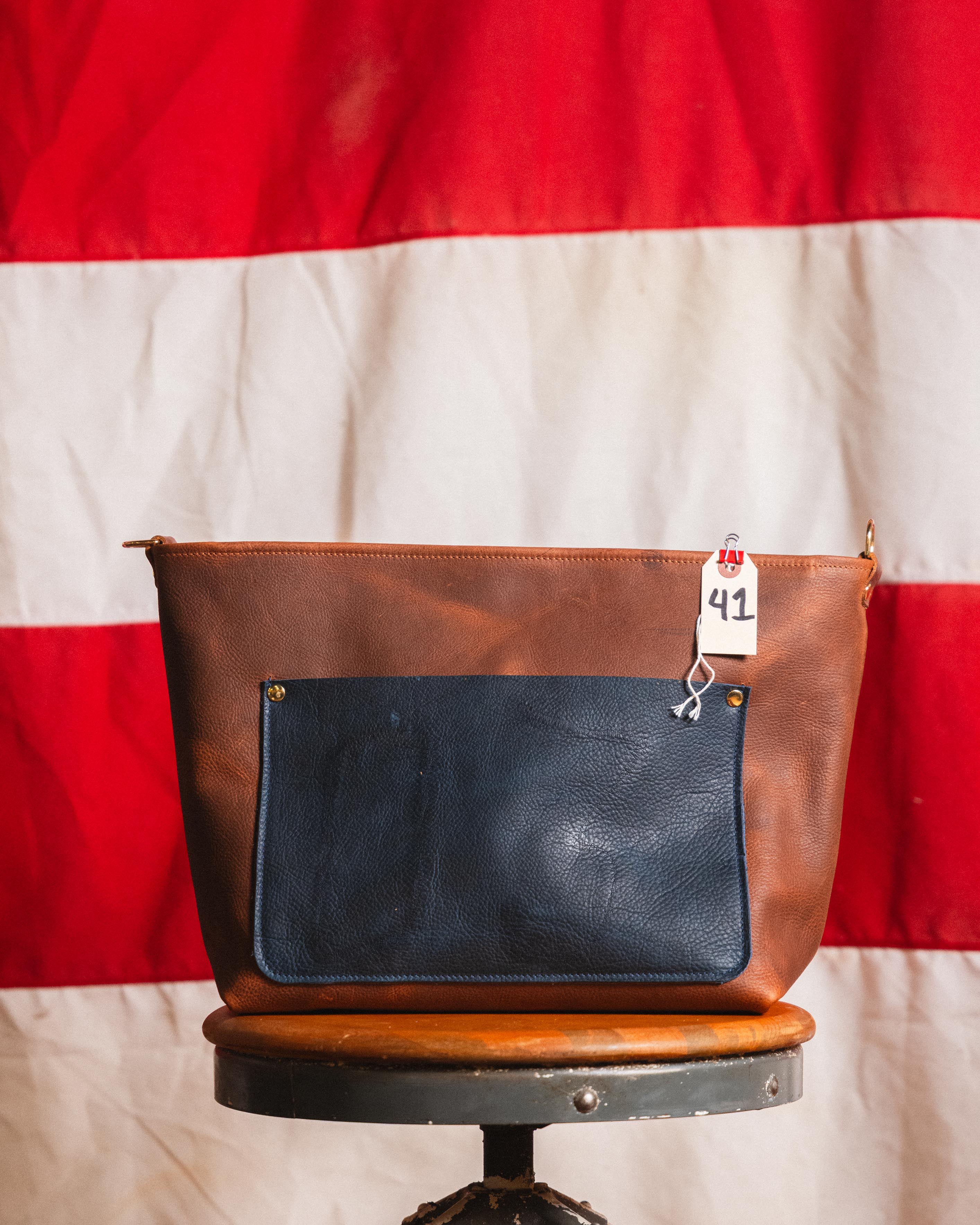 41. Branded Crossbody Travel Tote Tan and Navy Kodiak with Zipper