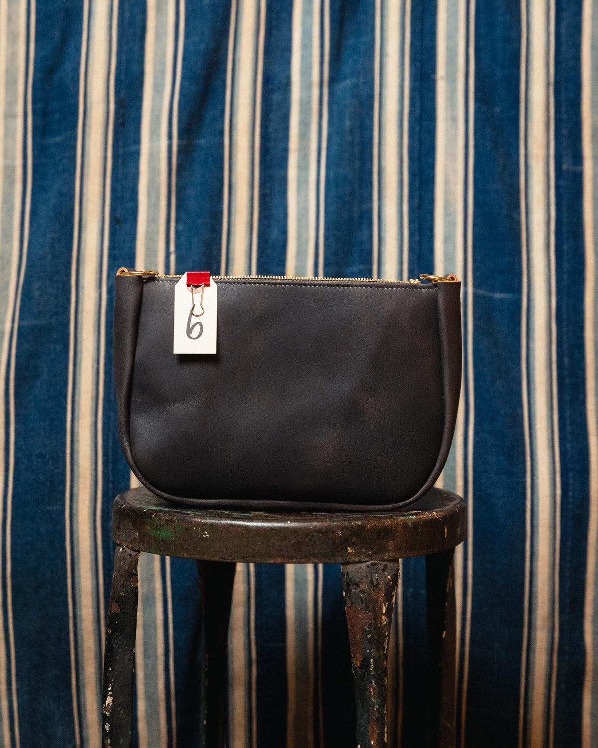 6. Charcoal Roadmaster Medium Crossbody Bag
