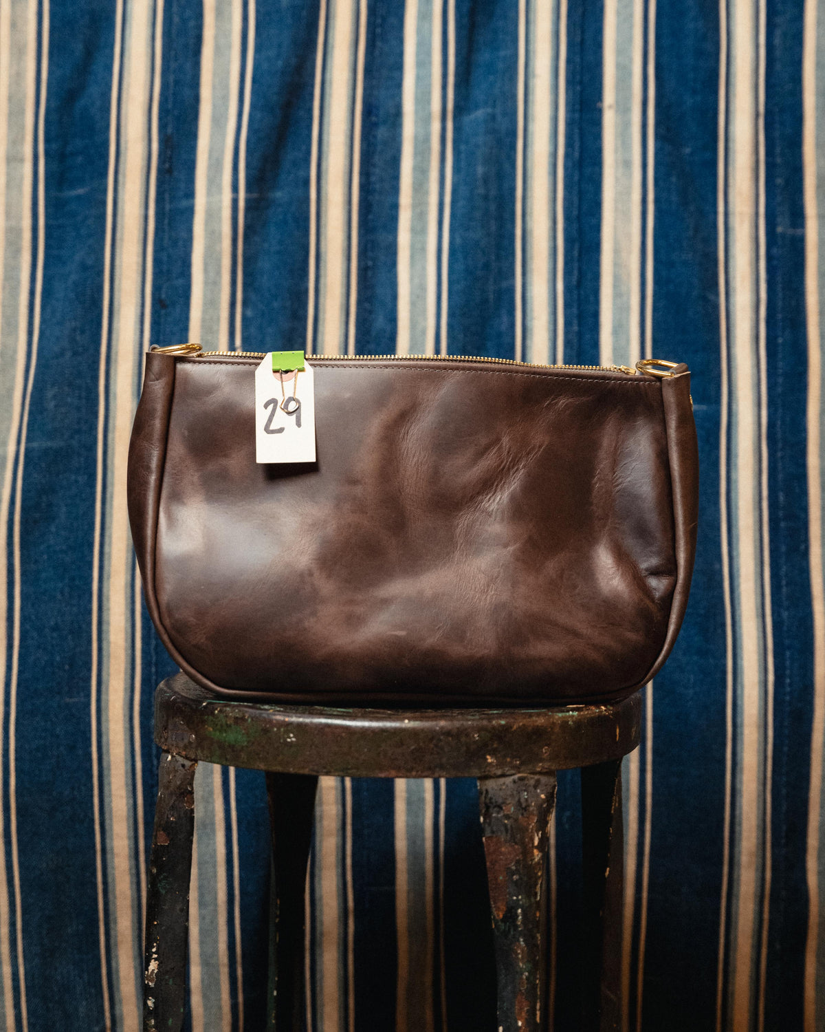 29. Glossy Grey Crossbody Bag