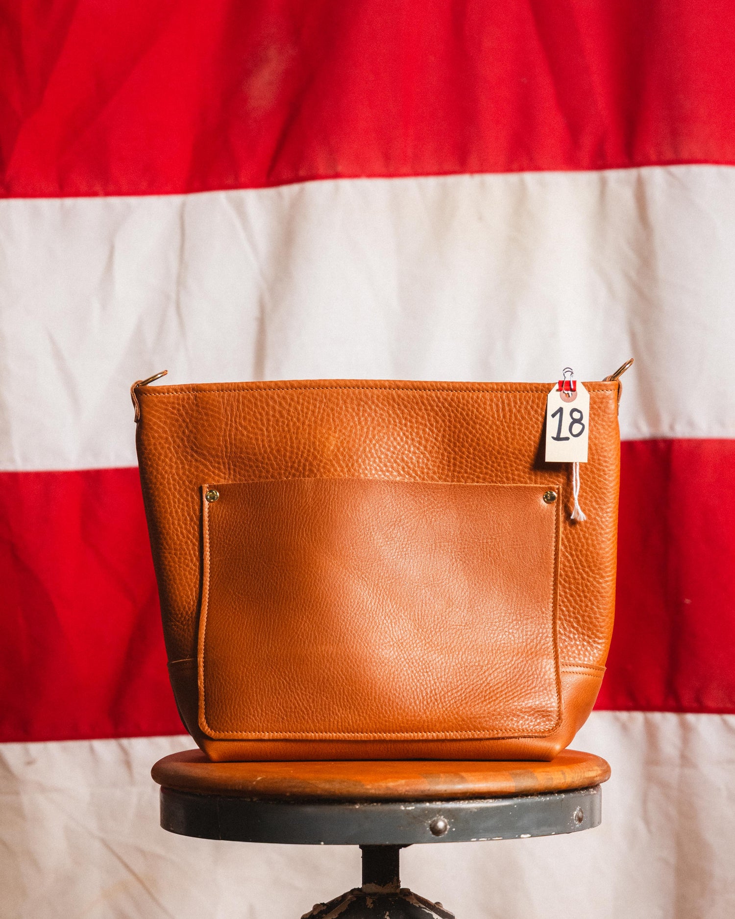 18. Cognac Cypress Crossbody Travel Panel Tote