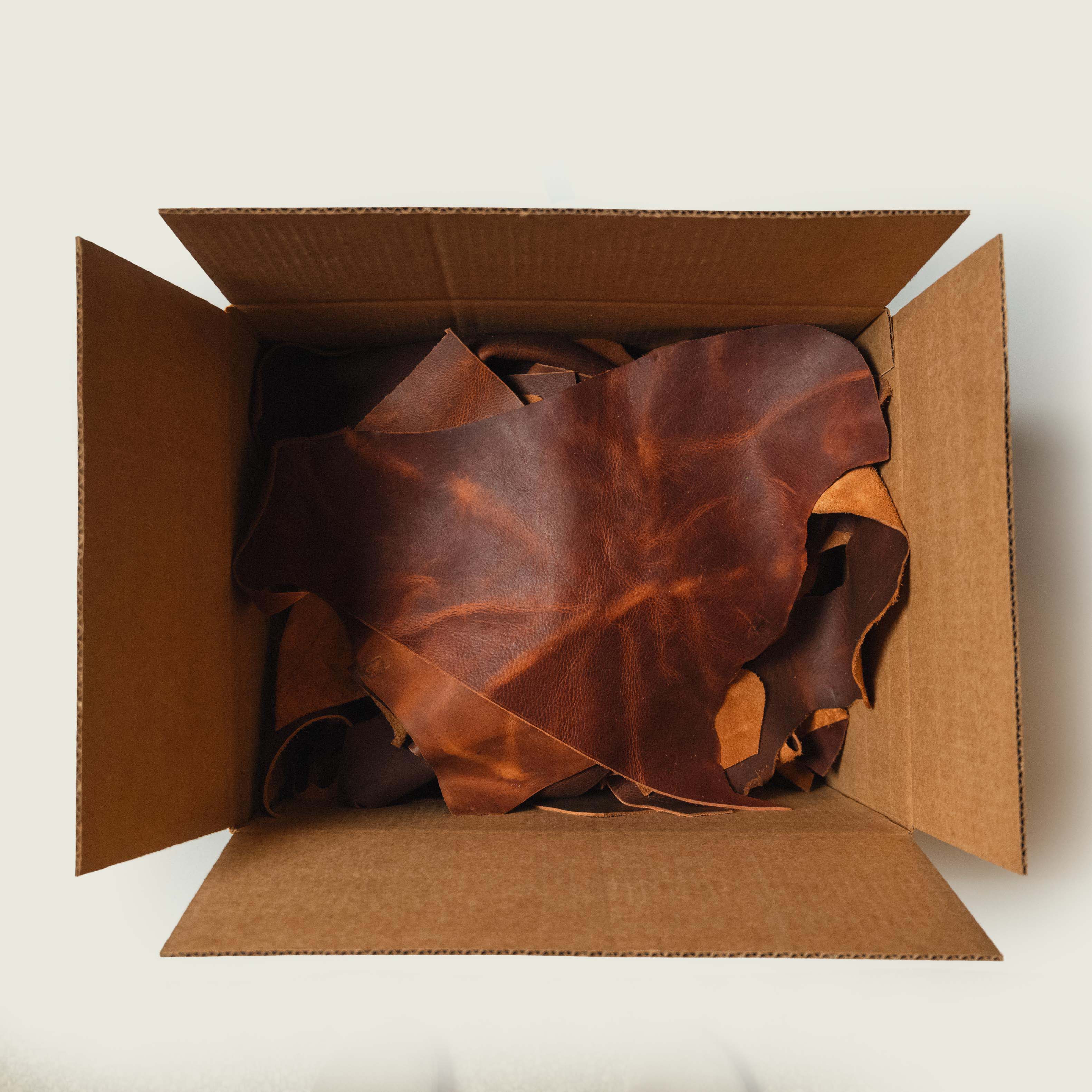 20lbs of Scrap Tan Kodiak Leather