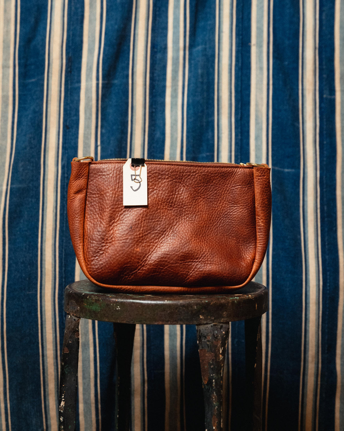 5. Tan Kodiak Medium Crossbody Bag