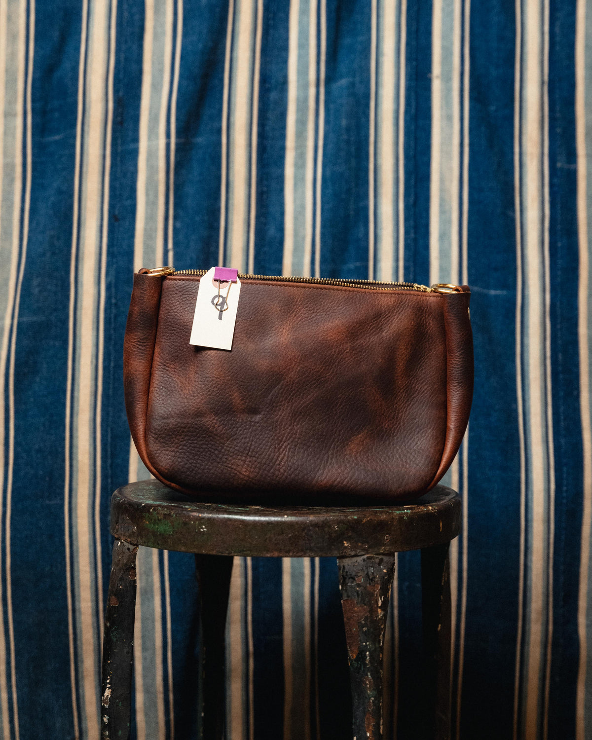 9. Brown Kodiak Medium Crossbody Bag