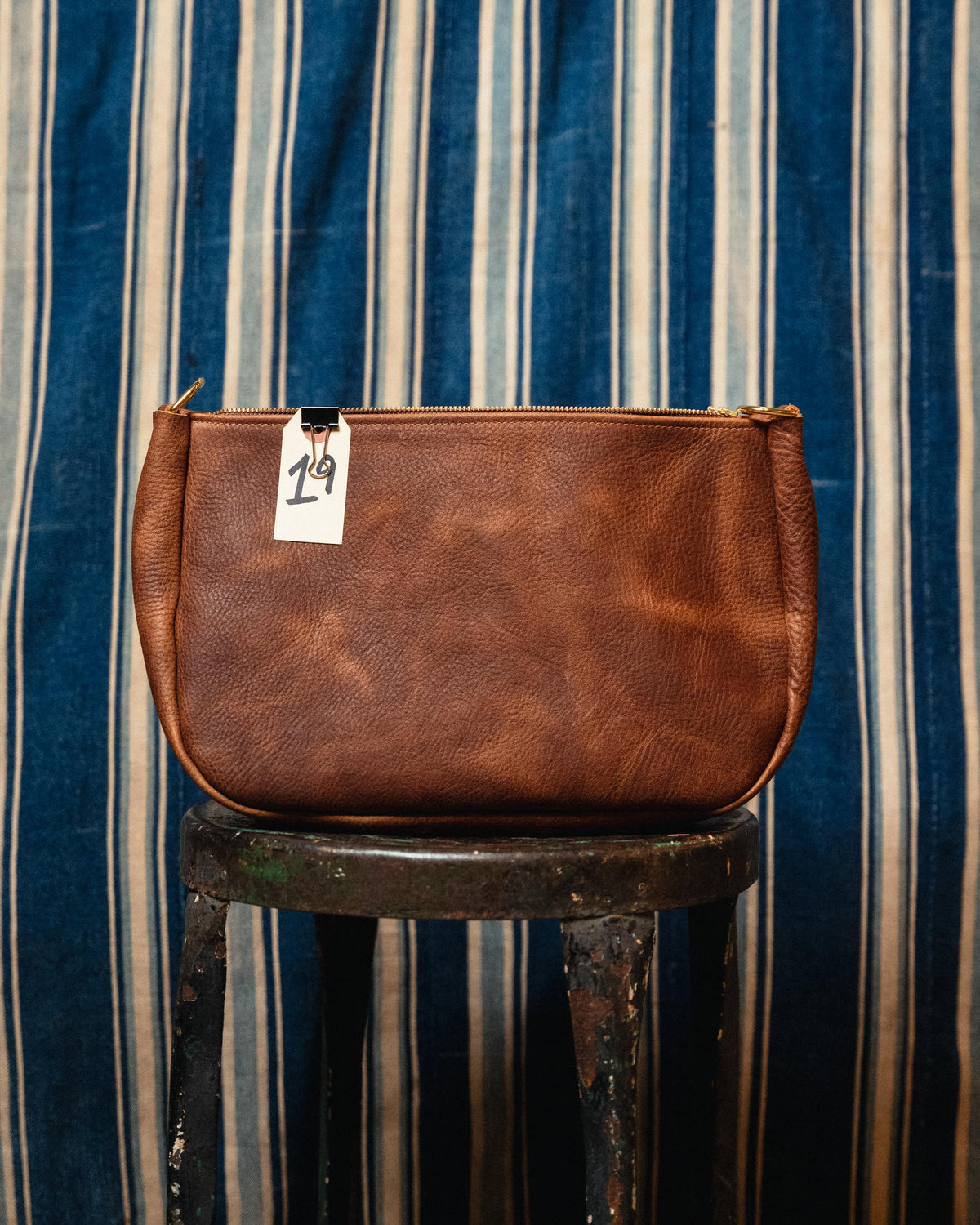 19. Tan Kodiak Crossbody Bag
