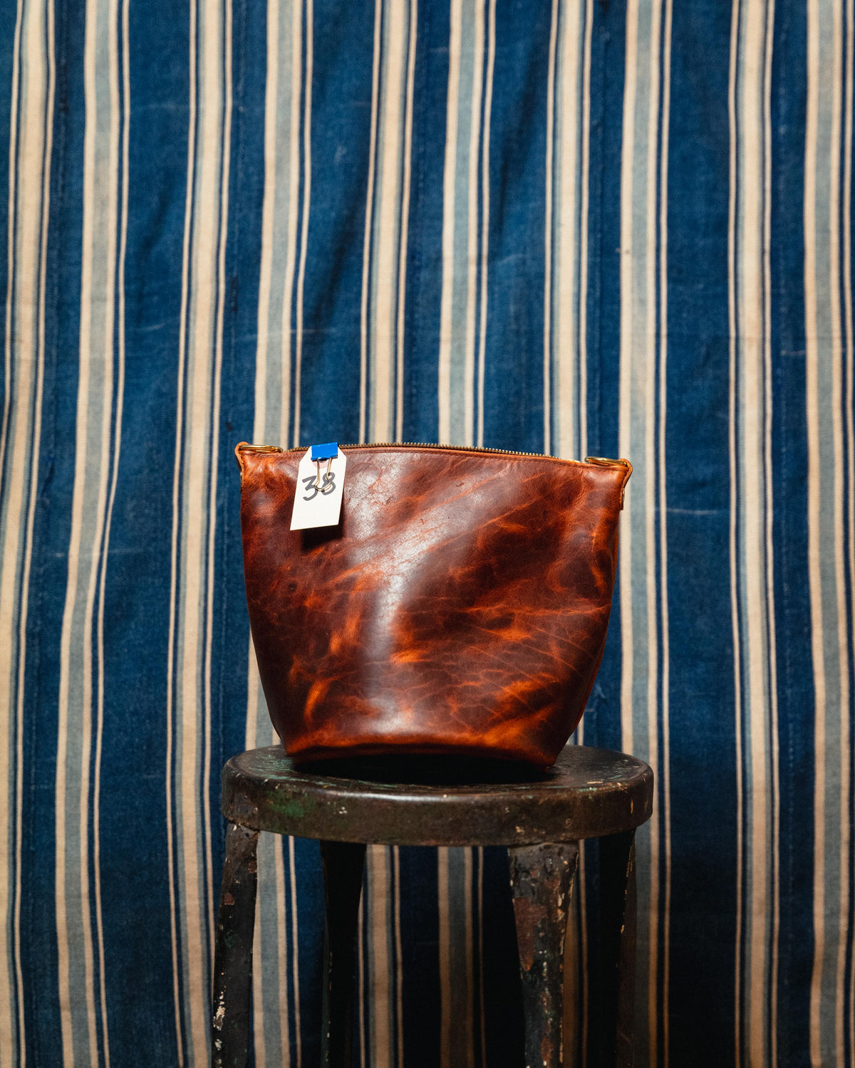 38. Tan Rustic Bison Mini Zip Top Bucket Bag