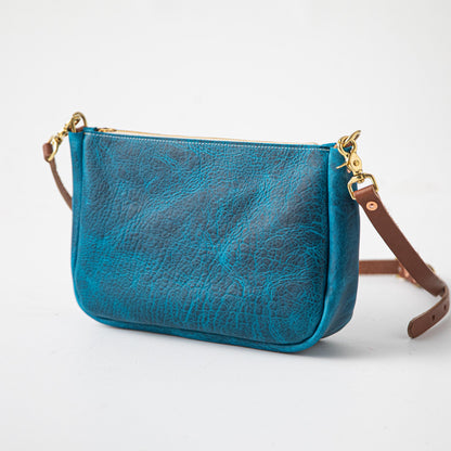 Petrol Blue Bison Crossbody Bag, handcrafted full-grain leather with a solid brass zipper and D-rings.