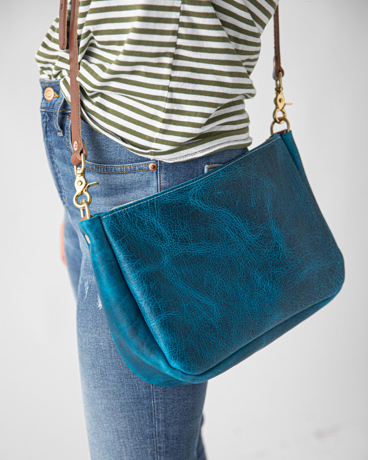 Petrol Blue Bison Crossbody Bag, handcrafted full-grain leather with a rich texture, solid brass hardware.